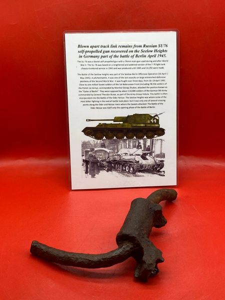 Blown apart track link remains with pin from Russian SU76 self propelled gun recovered from the site of a destroyed SU76 gun from the battlefield on the Seelow Heights in 1945 the opening battle for Berlin