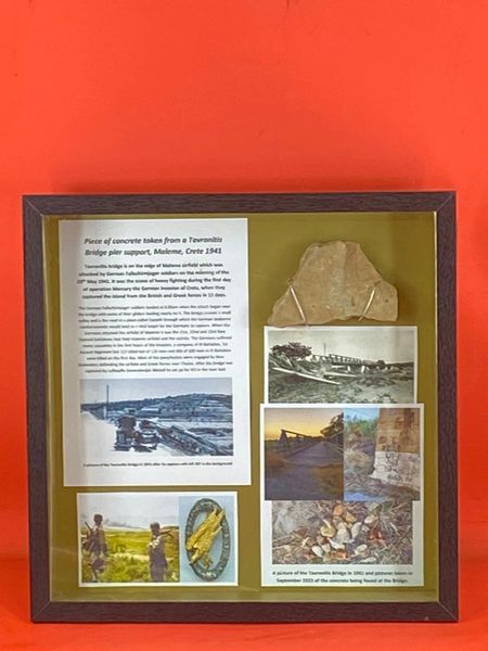 Large glass framed display a Piece of concrete from a Tavronitis Bridge pier support the famous bridge near Maleme airfield captured by German Fallschirmjager soldiers in the battle of May 1941 on the Island of Crete
