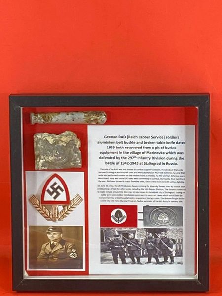 Glass framed German RAD [Reich Labour Service] soldiers aluminum belt buckle and table knife dated 1938 recovered in the area of the village of Marinovka which was defended by the 297th Infantry Division during the battle of 1942-1943 at Stalingrad