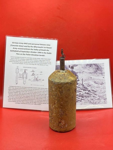 German Army M43 anti-personnel Betone mine [Concrete mine] with its fuse and original paintwork used by the Whermacht 1st Panzer Army recovered from the Valley of Death the battlefield of late 1944 in the Dukla Pass on the Polish-Slovakian border.