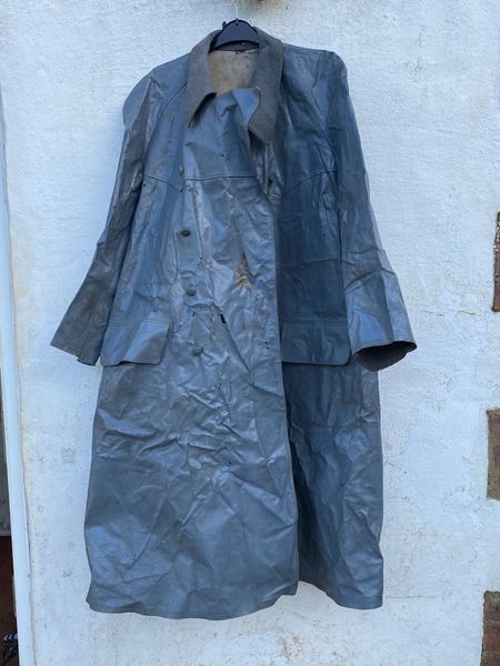 German Wehrmacht rubberized raincoat in well used condition worn by a soldier of the German 1st Army found in the city of Metz from the battle in the winter of 1944