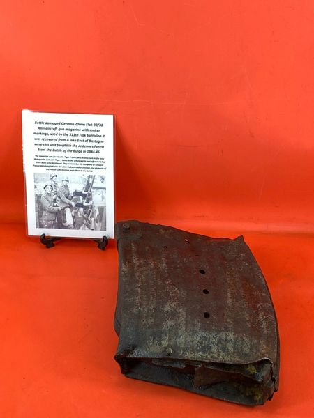 Fantastic condition battle damaged German 20mm Flak 30/38 Anti-Aircraft gun magazine which has its internal plate with maker markings ,belonging to Luftwaffe 311th Flak battalion recovered from a Lake near Bastogne,battle of the Bulge 1944-1945