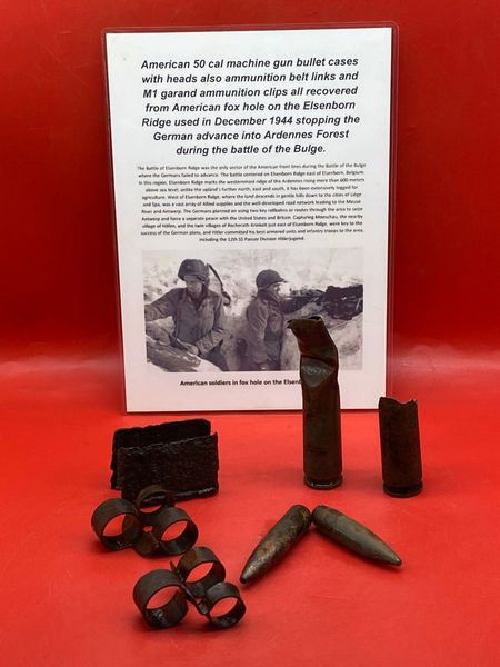 American 50 cal machine gun bullet cases with heads also ammunition belt links and M1 garand ammunition clip all recovered from American fox hole on the Elsenborn Ridge the battle of December 1944,Ardennes Forest during the battle of the Bulge.
