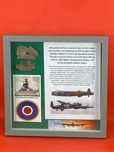 Glass framed very rare red painted airframe sections from aircraft insignia the roundel or markings from RAF Lancaster Number NG447 GI-U shot down on the 9th April 1945 attacking kiel Harbour and sinking battleship Admiral Scheer