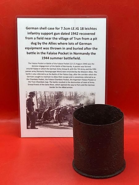 German steel shell case maker marked,dated 1942 fired by 7.5cm leichtes infantry support gun recovered from a field near Trun a pit dug by the allies where lots of German equipment buried after the battle in the Falaise Pocket, Normandy in France 1944