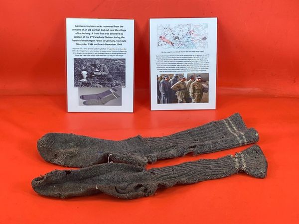 Very rare German army issue socks near complete solid,original colours recovered from old German dug out near the village of Lucherberg,defended by soldiers of the 3rd Parachute Division during the battle of the Hurtgen Forest,November-December 1944.