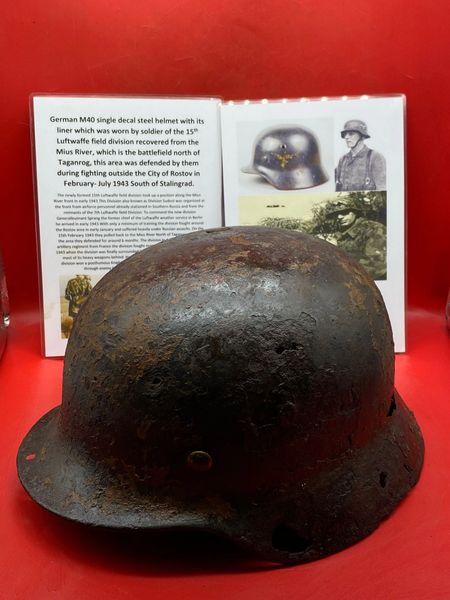 Very rare German M40 single decal steel helmet with complete liner,lots of paintwork worn by soldier in 15th Luftwaffe field division recovered from the Mius River north of Taganrog defended by them in fighting at Rostov in 1943 near Stalingrad.
