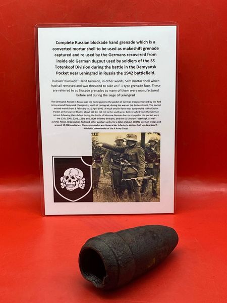 Complete empty Russian blockade hand grenade still with all its black paintwork used by soldiers in the SS Totenkopf Division recovered outside old German SS dugout in the Demyansk Pocket near Leningrad in Russia,1942 battlefield