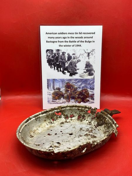 American soldiers mess tin lid recovered many years ago in the woods around Bastogne from the Bulge battle 1944-1945
