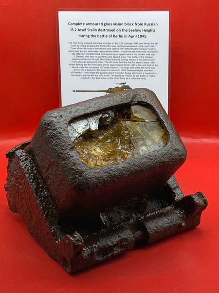 Complete armored glass vision block with its holding bracket attached from Russian IS-2 Josef Stalin tank recovered from the battlefield on the Seelow Heights in 1945 the opening battle for Berlin