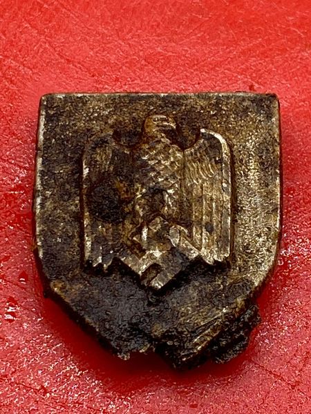 German Wehrmacht 1st grade shooter Shield for Army Marksman’s Lanyard with remains of lanyard attached nice solid relic with eagle recovered from the Falaise Pocket in Normandy 1944 battlefield