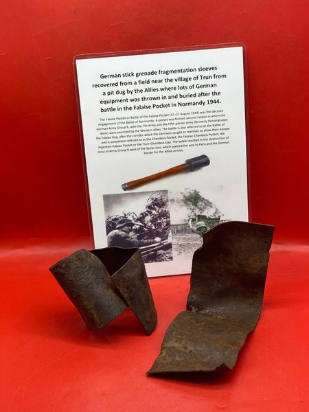 2 Stick grenade fragmentation sleeves both near complete with original paintwork,ripped and bent recovered near Trun a pit dug by the allies where lots of German equipment buried after the battle in the Falaise Pocket, Normandy in France 1944