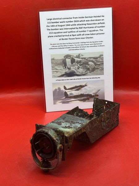 Large electrical plug socket with part numbers and paintwork from German Heinkel He 111 bomber work number 2624,shot down 14th of August 1940 it crashed landed with all crew taken prisoner at Border house farm near Chester