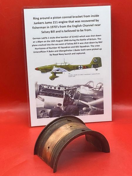 Engine piston conrod top ring with original colour from inside Junkers Jumo 211 engine on German Ju87b-1 stuka dive bomber which was shot down in the English channel on the 16th August 1940 during the Battle of Britain