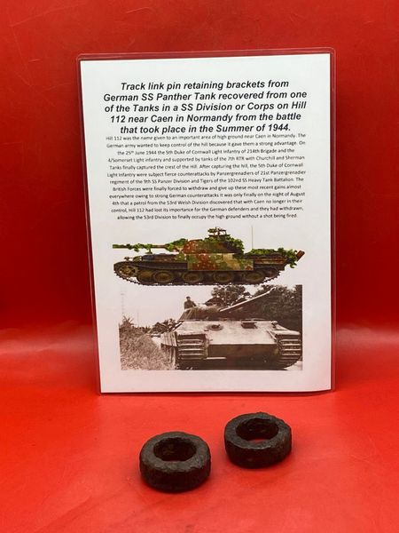 Track link pin retaining brackets from a German Panther tank from one of the SS Division or Corps Tank properly the 9th SS Panzer Division which was defending Hill 112 near Caen in Normandy 1944 battle