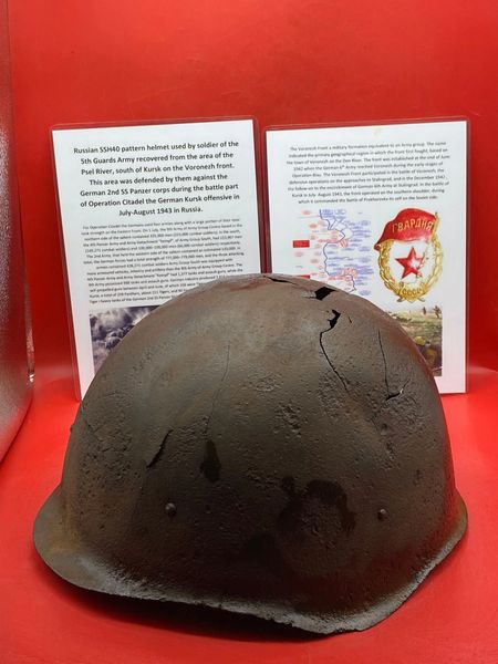 Russian SSh40 Helmet worn by soldier of the 5th Guards Army solid relic with green paintwork remains,blast cracks recovered from Psel River area,south of Kursk defended by them against German 2nd SS Panzer corps in Kursk offensive in July-August 1943