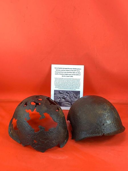 Pair of Russian SSh40 Helmets worn by soldier of the 69th Army in very relic condition recovered near the river Oder at Lebus south of Seelow Heights 1945 battlefield the opening battle for Berlin