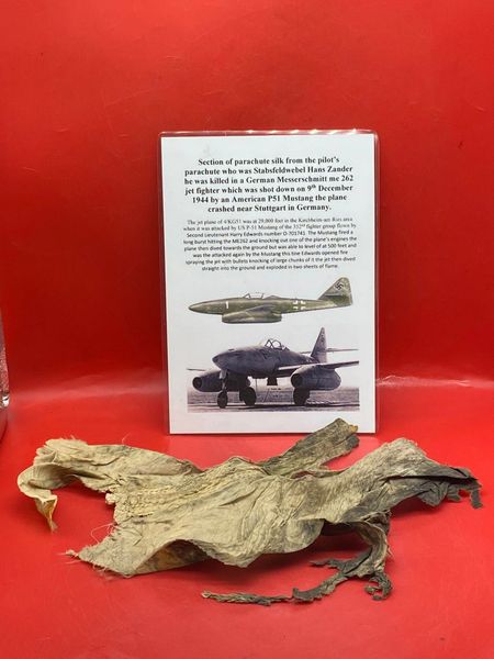 Section of burnt parachute silk from the pilot’s parachute who was Stabsfeldwebel Hans Zander in German Messerschmitt 262 jet plane it was shot down on the 9 December 1944 over Germany by American fighters