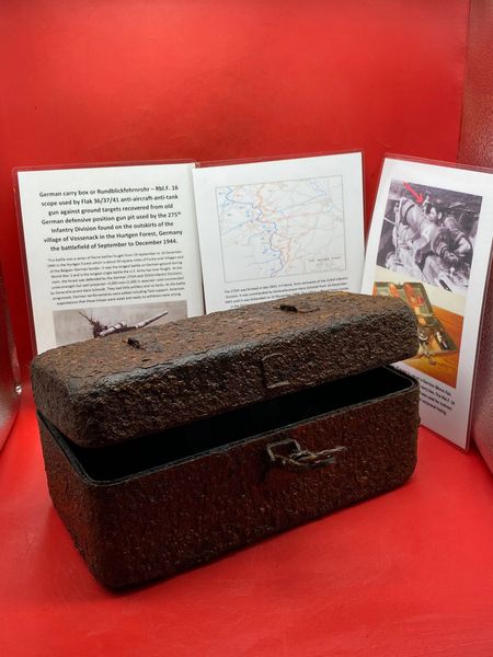 German carry box or Rundblickfehrnrohr – Rbl.F. 16 scope used by 88mm anti-aircraft-anti-tank gun against ground targets recovered from old German gun pit used by the 275th Infantry Division found near Vossenack in the Hurtgen Forest in Germany 1944.