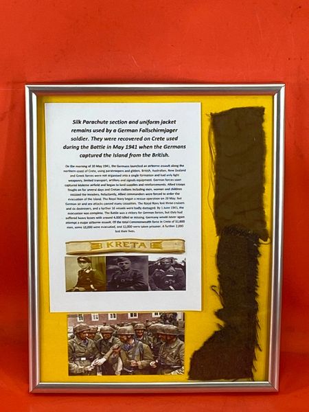 Glass framed Very rare section of silk parachute and soldiers uniform remains with many pictures very nice condition used by Fallschirmjager soldiers during the invasion and battle of Crete in May 1941.