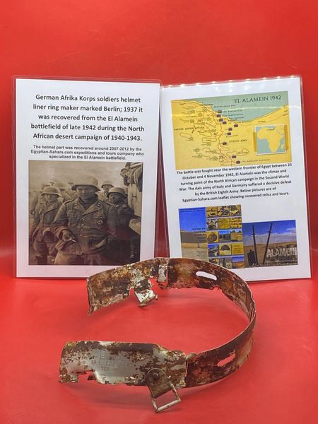 Very rare German Afrika Korps soldiers battle damaged aluminum helmet liner ring maker marked Berlin 1937 still original colour that was recovered from the El Alamein battlefield of late 1942 during the North African desert campaign of 1940-1943.