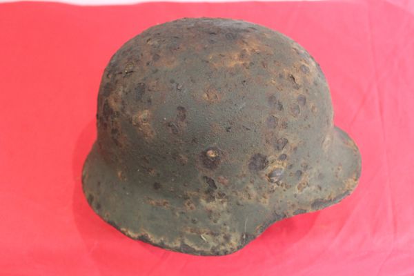 Super condition relic German helmet with large amount of paint remaining recovered from near Elsenborn Ridge in the Ardennes Forest, battle of the bulge 1944-1945