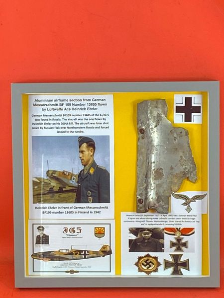 Glass framed Very rare airframe section with original gray/green paintwork from Messerschmitt bf109 serial number 13605 flown by luftwaffe ace Heinrich Ehrler when he got his 200th kill over the Eastern Front