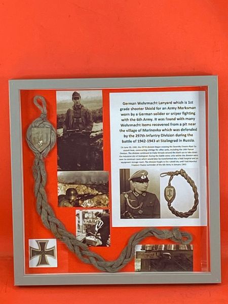 Very rare glass framed near complete German Wehrmacht 1st grade shooter Shield Army Marksman’s Lanyard nice clean relic recovered in the village of Marinovka,defended by the 297th Infantry Division during the battle of 1942-1943 at Stalingrad in Russia.