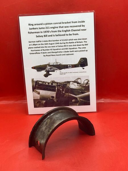 Engine piston conrod top ring with original colour from inside Junkers Jumo 211 engine on German Ju87b-1 stuka dive bomber which was shot down in the English channel on the 16th August 1940 during the Battle of Britain