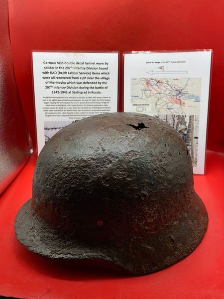 German M35 steel helmet double decal, lots of original green paintwork remains worn by a soldier of the 297th Infantry Division recovered from a pit in the village of Marinovka, defended by them during the battle of 1942-1943 at Stalingrad