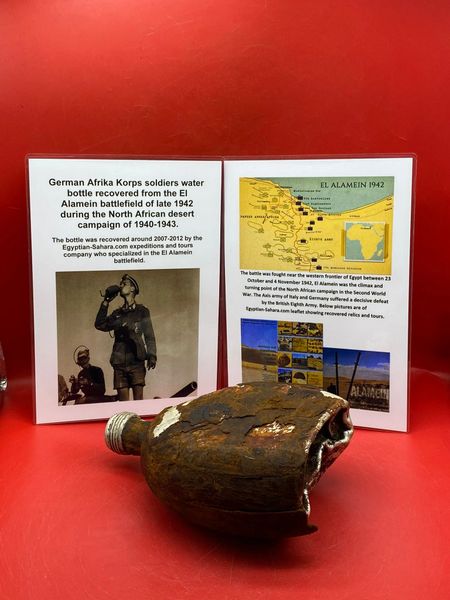 Very rare German Afrika Korps soldiers battle damaged wooden covered waterbottle still original colours that was recovered from the El Alamein battlefield of late 1942 during the North African desert campaign of 1940-1943.