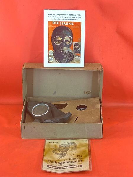 Original World war 2 German complete 1939 civillian children's respirator and original box found on a flea market at Berlin railway station in 2005