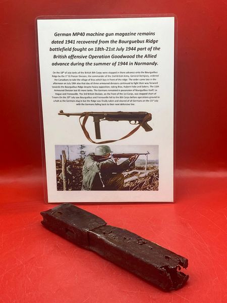 German MP40 machine gun magazine remains nice solid relic,original colours-waffen stamp,dated 1941 recovered near Trun a pit dug by the allies where lots of German equipment buried after the battle in the Falaise Pocket, Normandy in France 1944