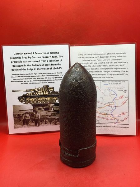 German a fired 75mm KwK40 armour piercing projectile+blast cracks used by a German panzer 4 tank in the Panzer Lehr Division it was recovered from a lake East of Bastogne in the Ardennes Forest from the Battle of the Bulge in the winter of 1944-45.