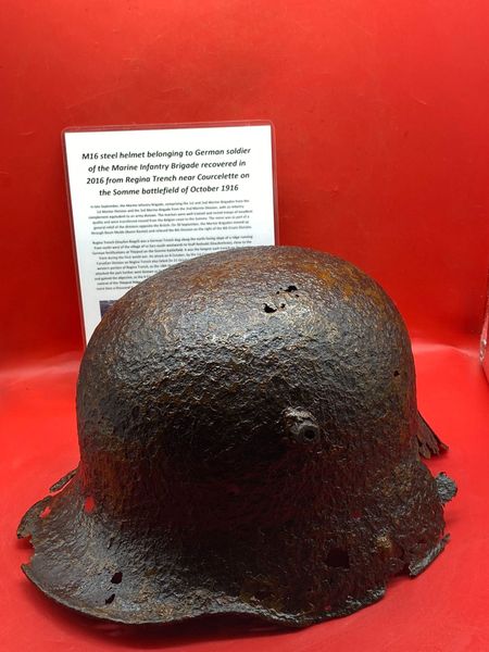 German M16 steel helmet belonging to a soldier of the Marine Infantry Brigade solid relic condition well cleaned,green paintwork remains recovered in 2016 from ,Regina Trench near the village of Courcelette on the Somme battlefield of October 1916