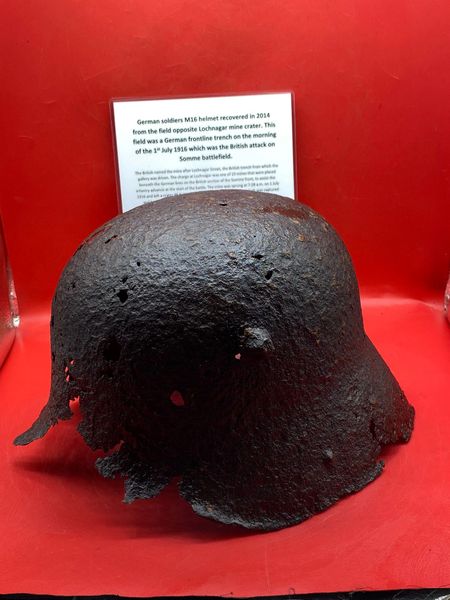 German M16 helmet solid relic condition recovered in 2014 from the old German trench line at La Boisselle in the field opposite where the Lochnagar mine crater on the Somme July 1916 battlefield