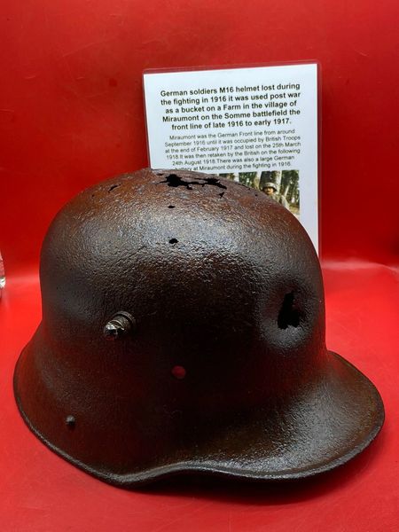 Fantastic condition German soldiers M16+impact damage, some original paintwork remains found in a barn in the village of Miraumont on The Somme battlefield of late 1916-1917