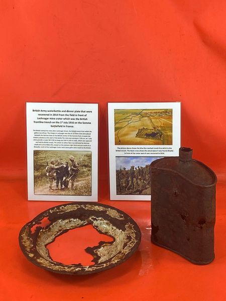 British soldiers battle damaged waterbottle and dinner plate that were recovered in 2014 from the field in front of Lochnagar mine crater which was the British frontline trench on the 1st July 1916 on the Somme battlefield in France