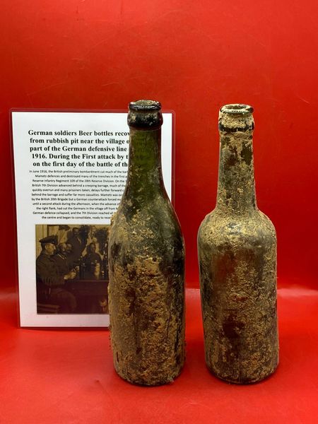 Pair of German soldiers glass Beer bottles,still in Somme mud recovered 2012 from rubbish pit near the village of Mametz part of the German defensive line on 1st July 1916. During the First attack by the British on the first day of the Somme.