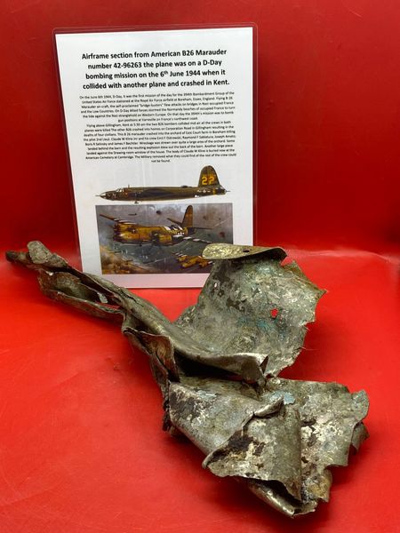 Large aluminium airframe structure section with lots of green-brown and black paint remains from American B26 Marauder number 42-96263 shot down on D-Day 6th June 1944 it crashed at Gillingham in Kent