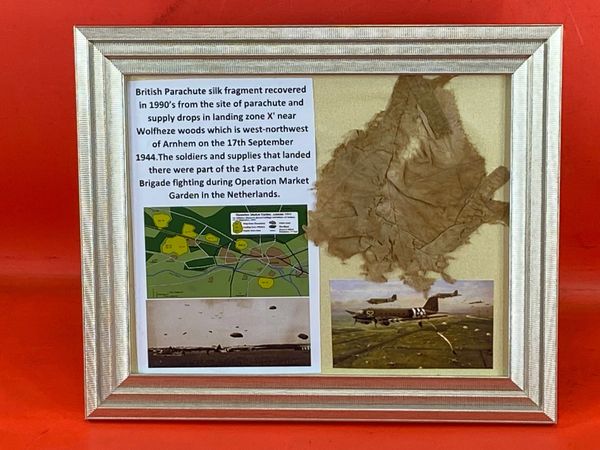 Glass framed display British Parachute silk section recovered in 1990’s from the site of parachute and supply drops in landing zone X' near Wolfheze woods near Arnhem on the 17th September 1944 where soldiers,supplies landed during Operation Market Garden