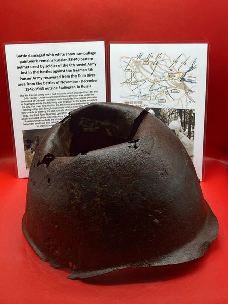 Very rare SSH40 pattern helmet solid relic battle damaged,original green and white snow camouflage paintwork remains worn by Russian soldier of the 6th soviet Army recovered from Dom river defended by them in January 1943 during the battle of Stalingrad