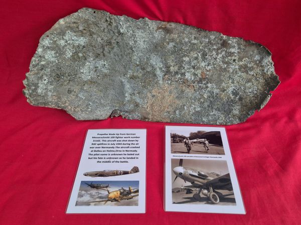 Propeller blade tip from German Messerschmitt 109 fighter, work number 31165. This aircraft was shot down by RAF Spitfires in July 1944 during the air war over Normandy . The aircraft crashed at Bellou en Holme, Orne in Normandy .