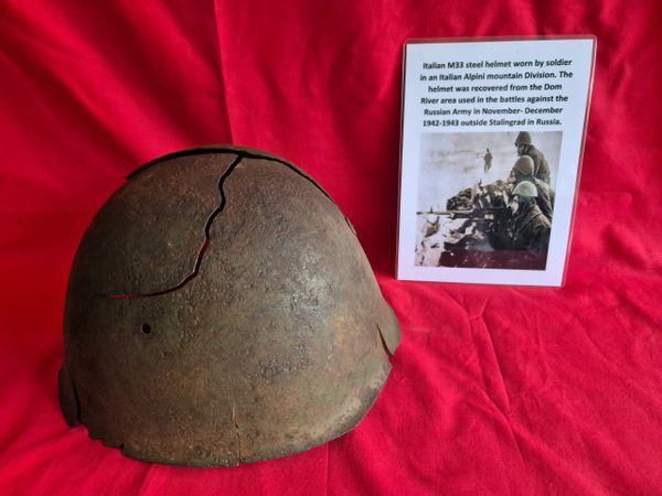 Italian M33 steel helmet recovered from Italian alpini division positions in the Dom river area outside Stalingrad