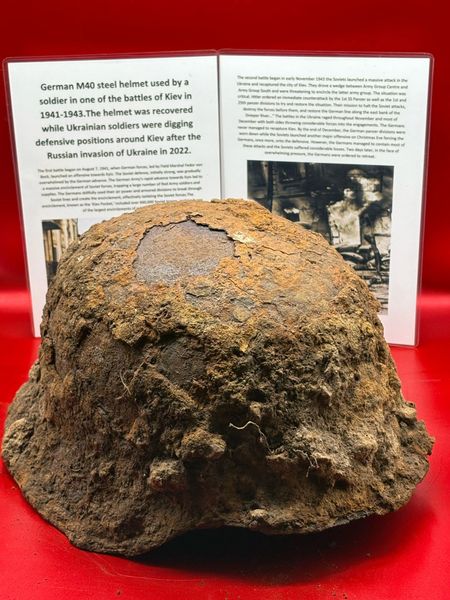 Fantastic as found with mud and tree root remains when recovered German M42 steel helmet used by a soldier in,battles of Kiev in 1941-1943,recovered while Ukrainian soldiers were digging defensive positions around Kiev after the Russian invasion in 2022.