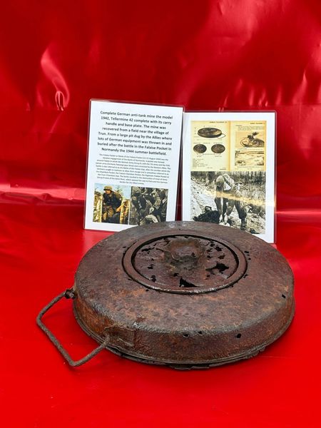 Lovely complete German anti-tank mine a Tellermine 42 with some original sand colour paintwork recovered from a field near Trun a pit dug by the allies where lots of German equipment buried after the battle in the Falaise Pocket, Normandy in France 1944