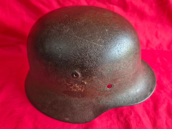 German M40 steel helmet with good remains of paint and decal recovered from the Monte Cassino area and kept in a local museum until it closed in 2015