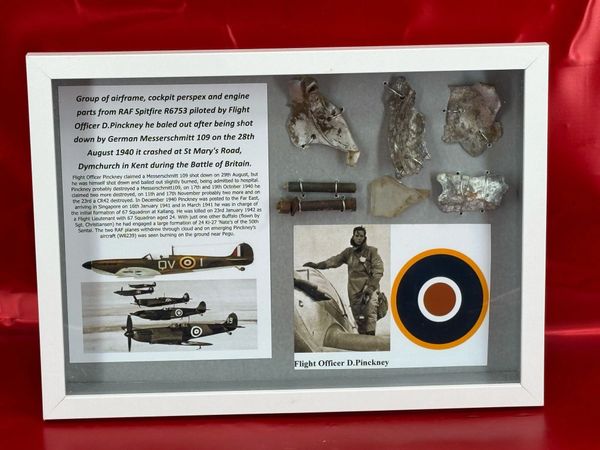Large glass framed group of airframe, cockpit perspex and engine parts from RAF Spitfire R6753 piloted by Flight Officer D.Pinckney he baled out after being shot down by German Messerschmitt 109 on the 28th August 1940