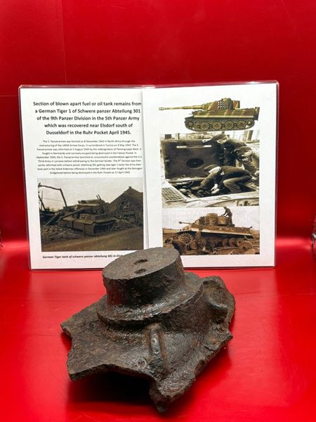 Section of blown apart fuel or oil tank remains with black paintwork remains from inside a German Tiger 1 Tank from a tank of Schwere Panzer Abteilung 301,9th Panzer Division recovered near Elsdorf,Ruhr Pocket April 1945