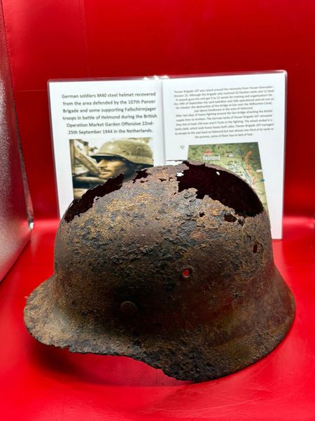 German M40 helmet very nice condition with green paintwork,maker stamp used by soldier of 107th Panzer Brigade recovered from old German gun pit position from the battle of Helmond, Operation Market Garden, September 1944, Netherlands.